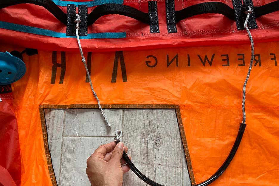 Wing harness line attachment